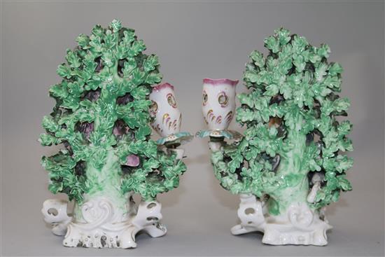 A pair of Derby figures of the Italian Farmers and a pair of Derby candlestick figures, 20.5cm, losses (4)